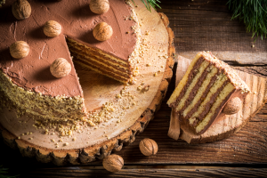 delicious-layered-cake-with-walnuts-on-rustic-wood-2026-03-24-14-14-40-utc