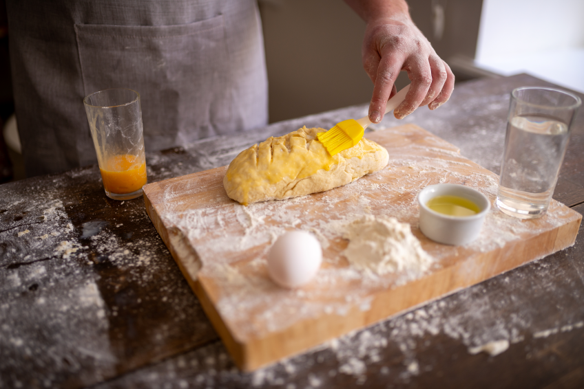 Should I Brush Bread With Butter Before Baking?