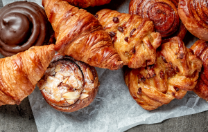 delicious-croissants-and-pastries-on-paper-backgro-2026-03-10-03-11-07-utc